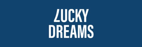 Lucky Dreams Casino free spins promotion page displayed on a laptop screen